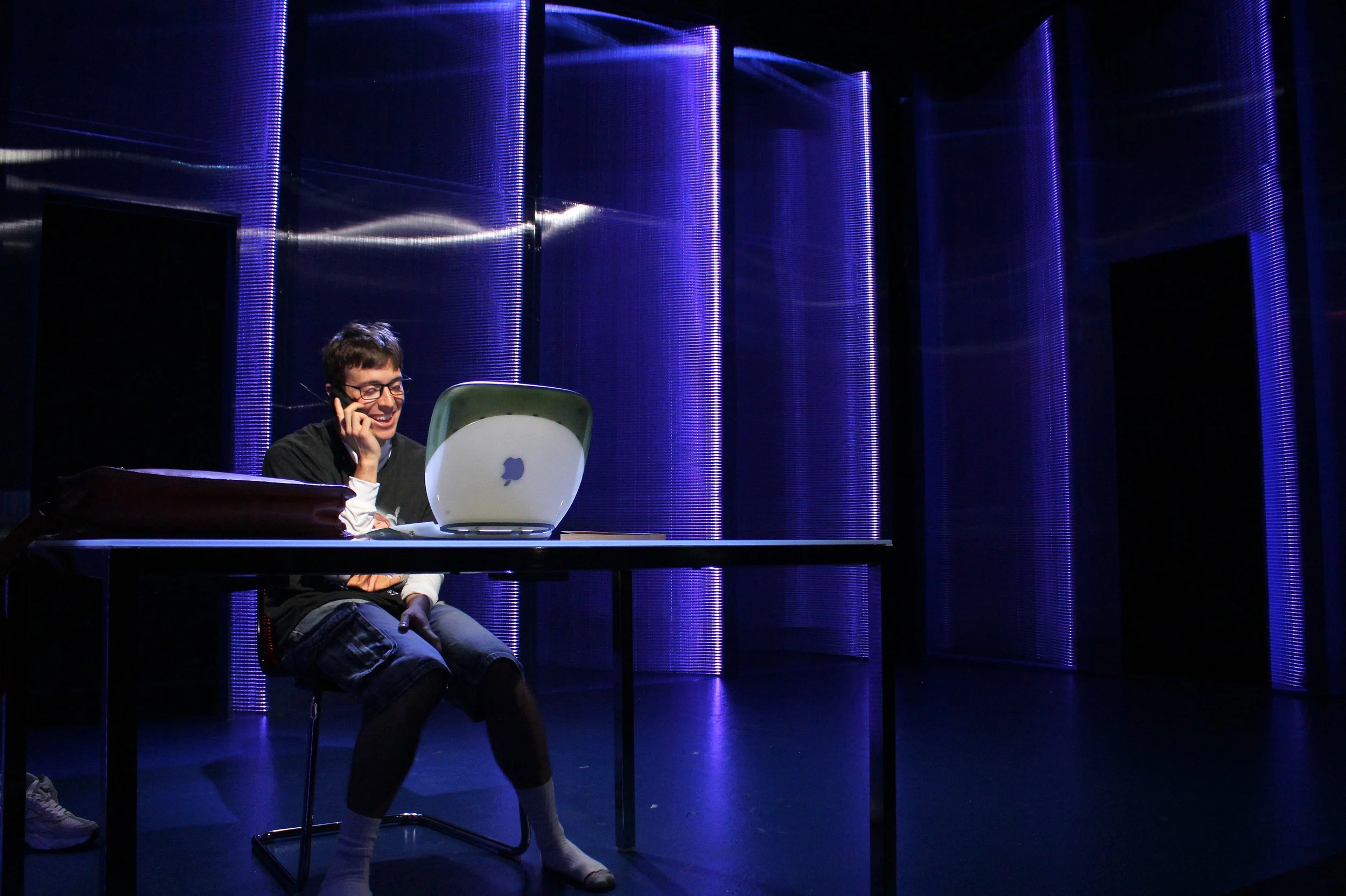   Nicholas Renee Rodriguez.   Scenic Design by Maya Linke  Lighting and Projection Design by Spense Matubang  Costume Design by Alice Ruiz  Sound Design by Chris Sauceda  Photograph by Samuel del Rosario 