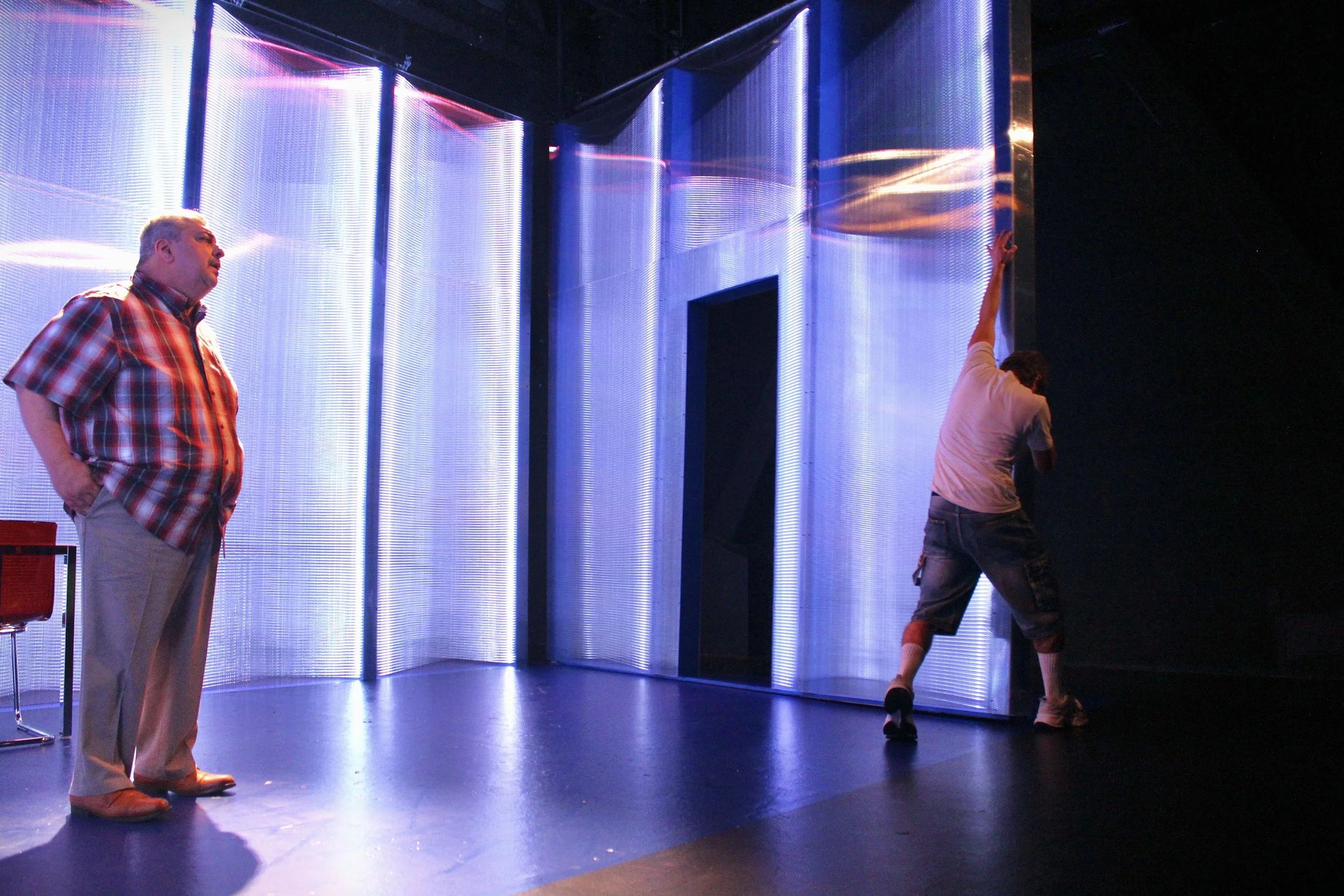   Richard Perez, Nicholas Renee Rodriguez.   Scenic Design by Maya Linke  Lighting and Projection Design by Spense Matubang  Costume Design by Alice Ruiz  Sound Design by Chris Sauceda  Photograph by Samuel del Rosario 