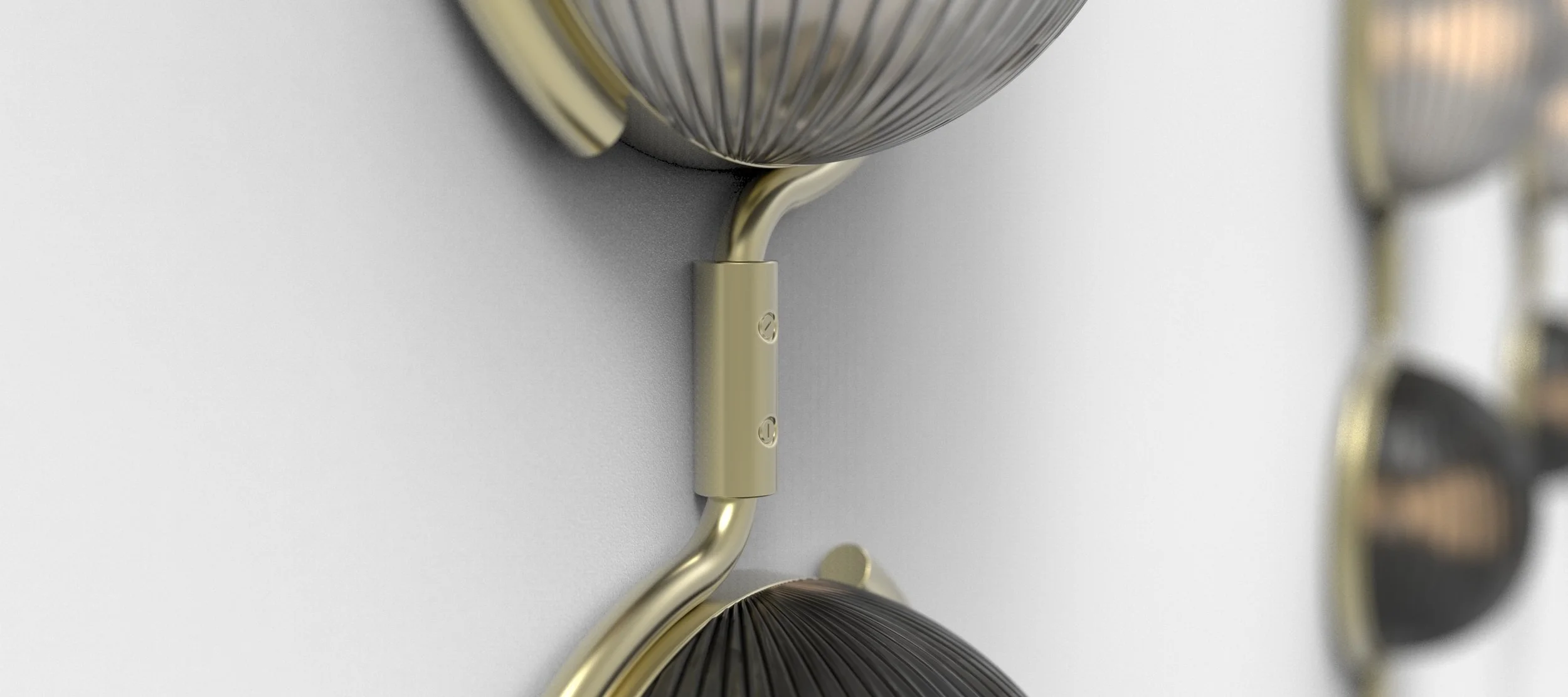  Two tones // two shapes of ribbed glass create a division tied together by the winding brass. 