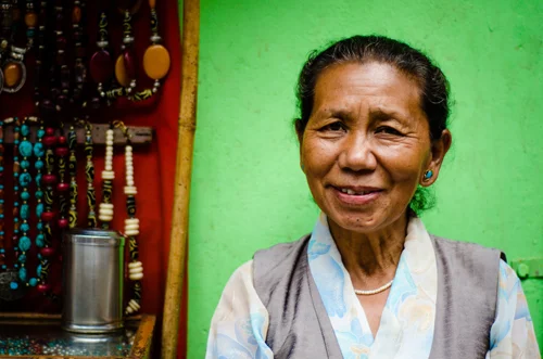 Woman selling jewellery in her roadside stall