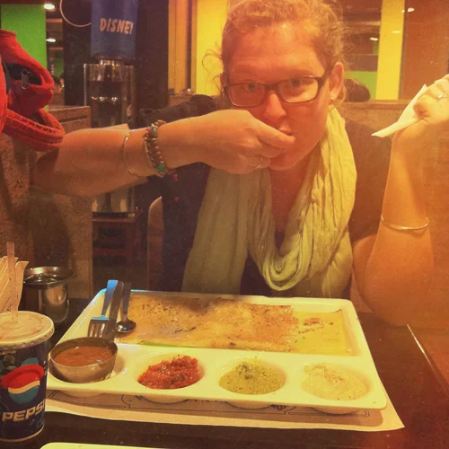 Mikayla really enjoying her dosa!