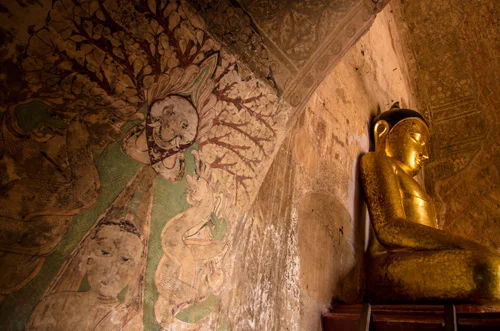 Some of the temples contained cracked and faded wall paintings.