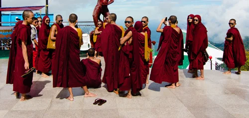 I'm still not sure I'm used to seeing monks with smart phones and designer sunglasses.