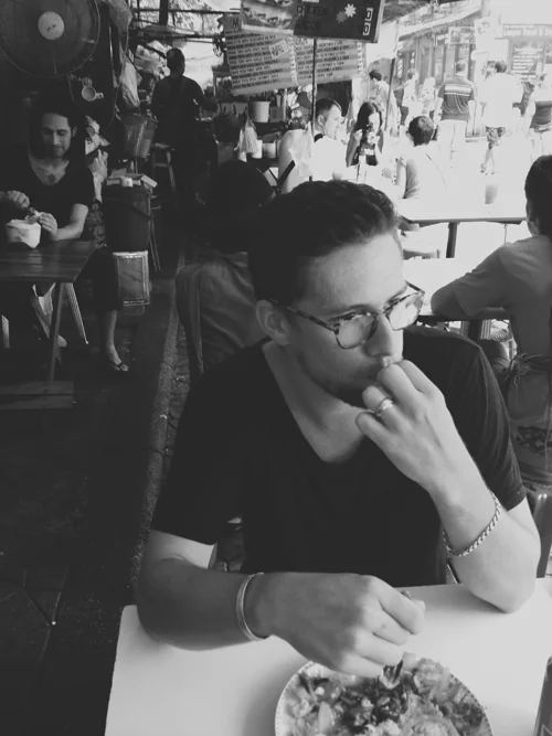 Ben munching on a prawn