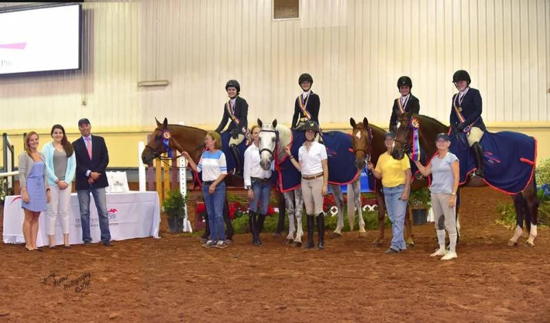 FOR IMMEDIATE RELEASE Oklahoma City, OK ---- July 15, 2016 ---- Excitement was in the air at the 2016 USHJA Children's and Adult Amateur Hunter Central Regional Championships , presented by SmartPak , July 13-17 at the GO Show in Oklahoma City, OK, as riders from zones 6 and 7 participated in the first-of-its kind event. The Championships kicked off on Wednesday with the Children's Team Championships, which provided an opportunity for a friendly, but competitive face-off between the two teams from Zone 7. "It was very friendly and very fun," Zone 7 Chef d'Equipe Joey Brumbaugh said about the competition. >> R ead Full Story <<