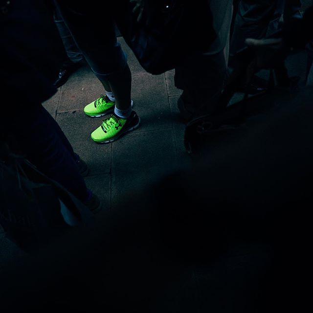 get your kicks #kicks #luckyshot #streetphotography #sneakers #dark #neongreen #underarmour