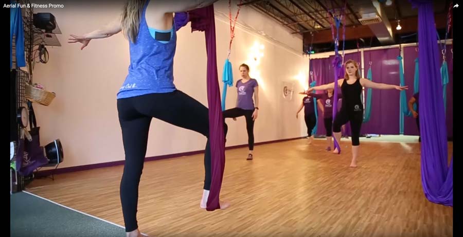 In the studio: students use aerial silks in class