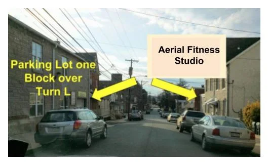For FREE Parking: Turn LEFT on the street before you get to the building. Parking is one street over on the big gravel lot.