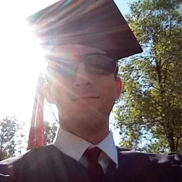 That's me at graduation from Carnegie Mellon. I majored in civil engineering, with a minor in architecture. I owe a lot of money in loans. And I want to do comedy. Isn't life weird?