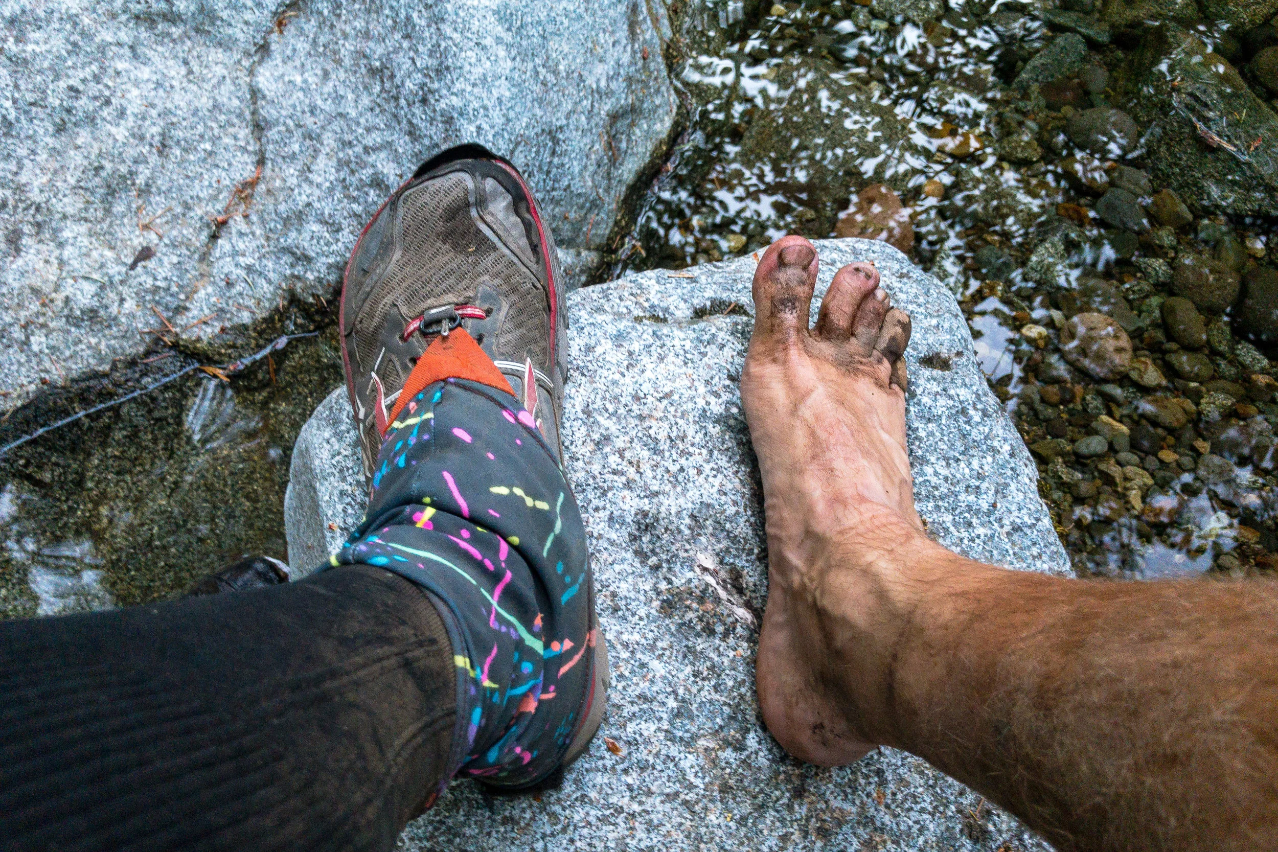 Washing my feet and socks downstream from others.