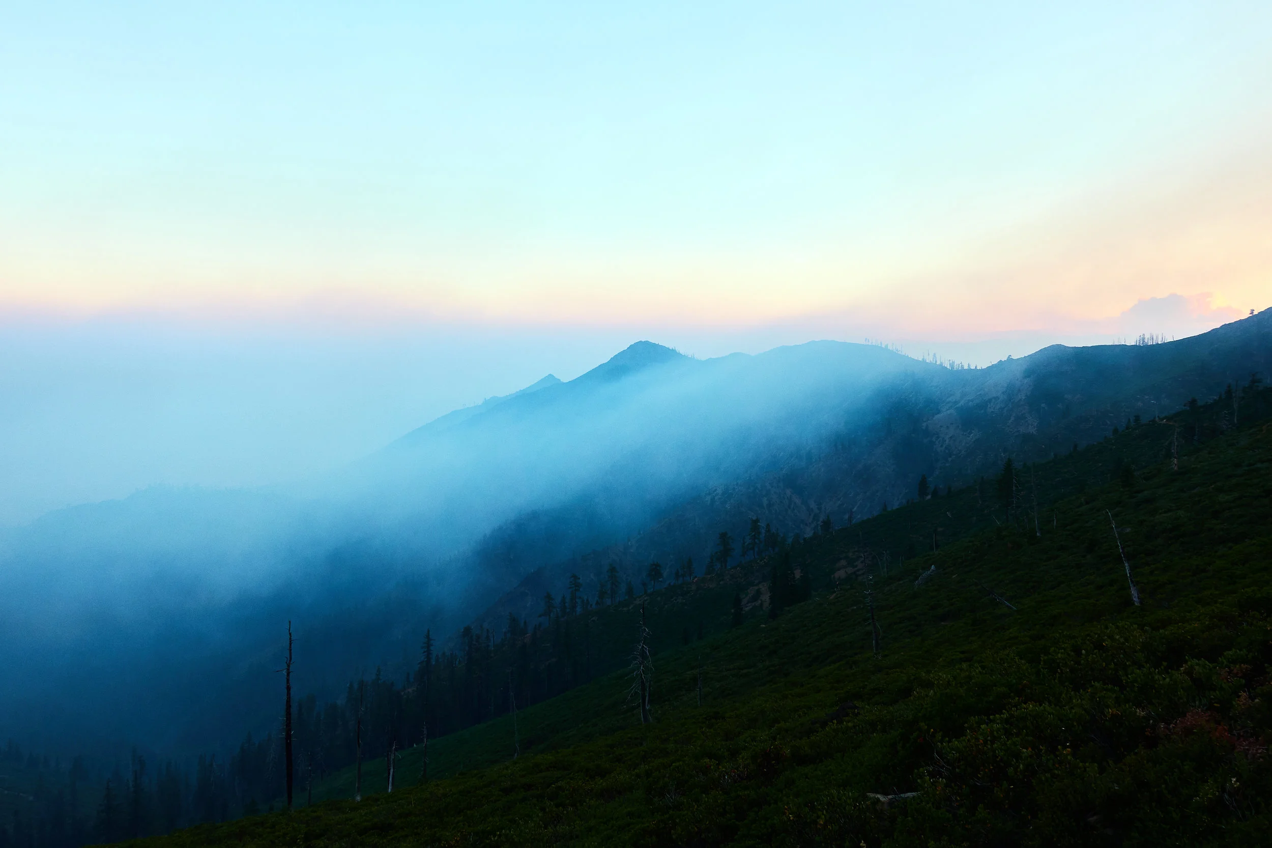 Smoke from the wildfires before the sun sets.