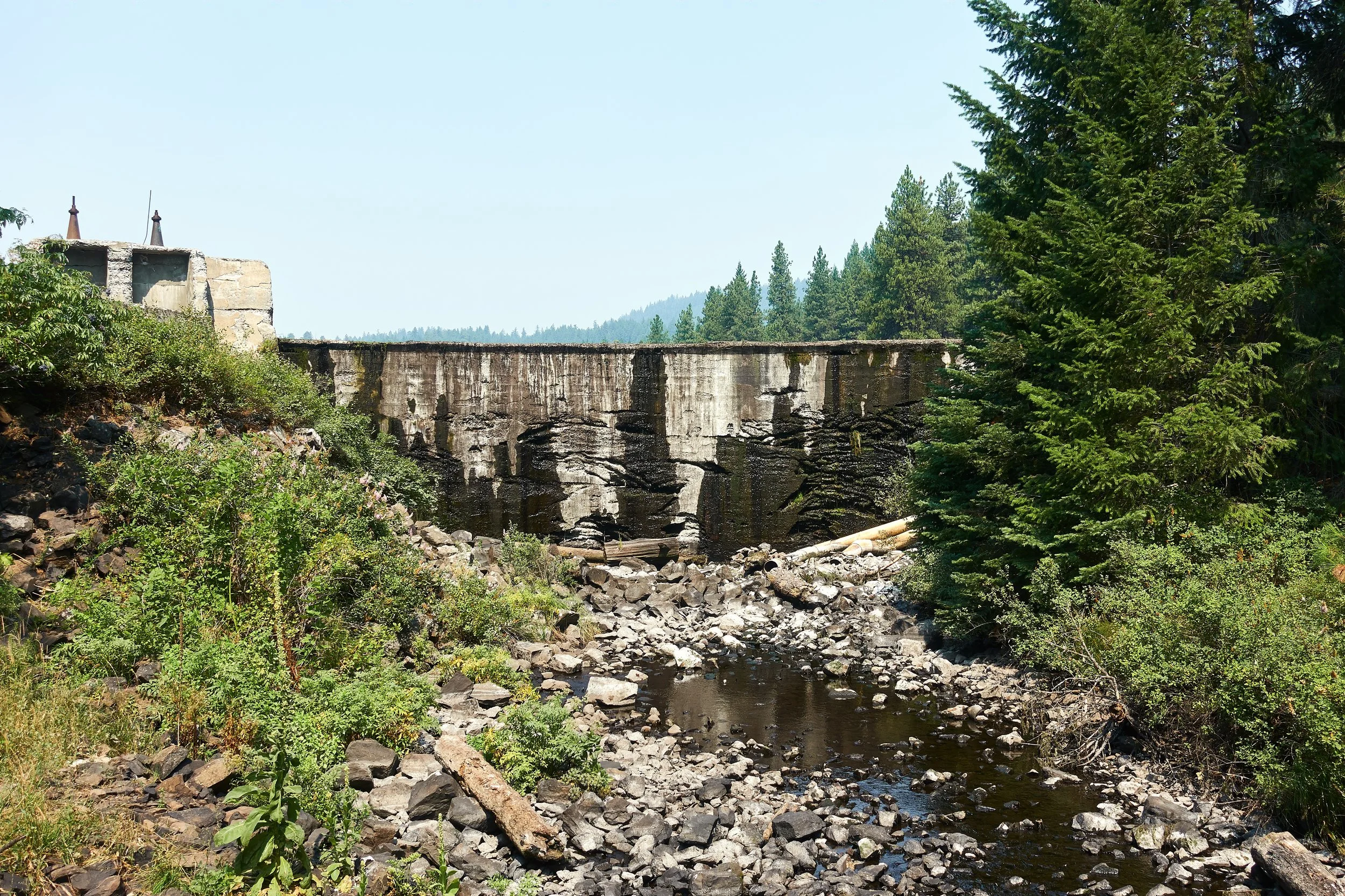 The dam with the lake behind it.