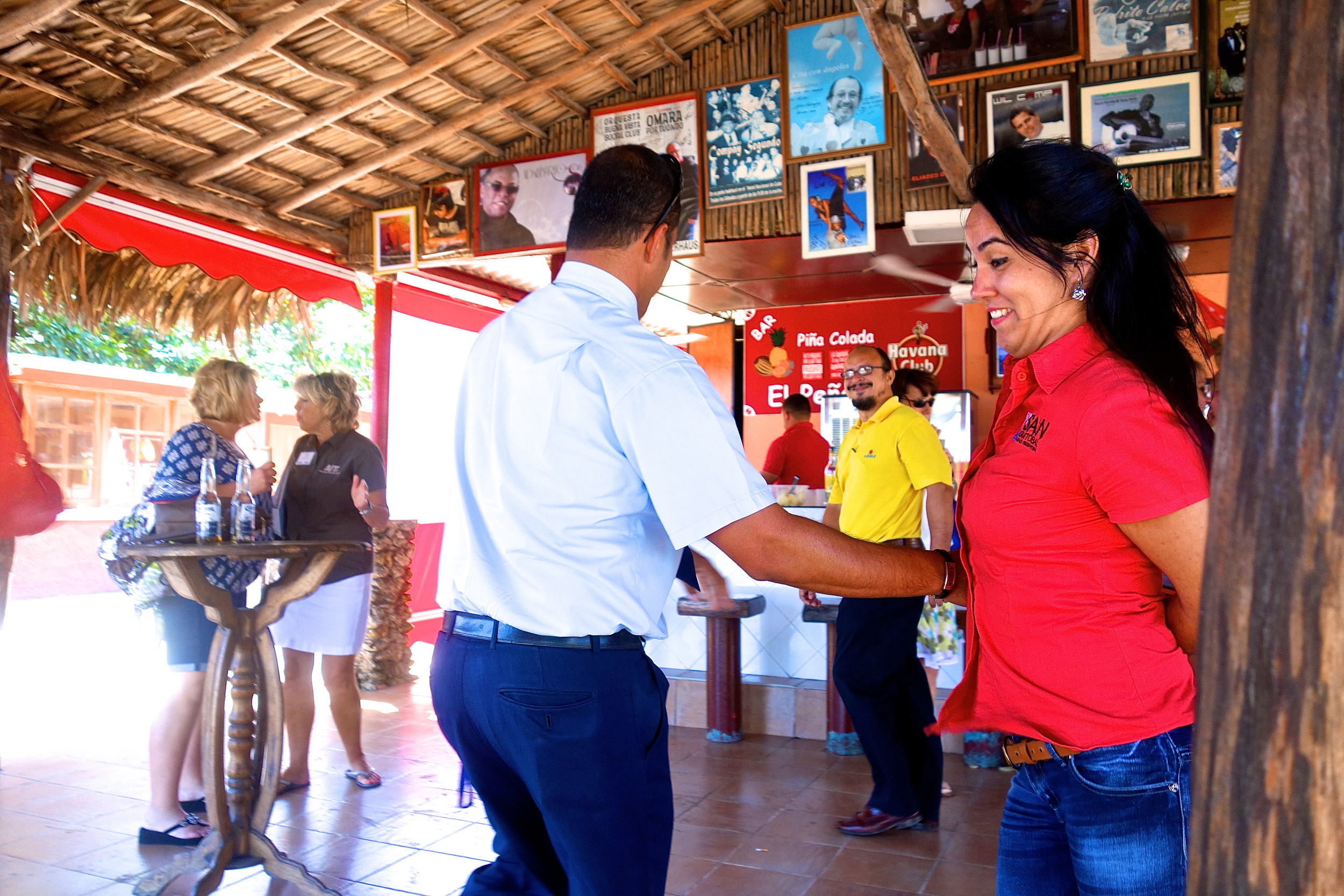  En route to Varadero, Neicy and our bus driver break into an impromptu salsa while we sip pina coladas. 