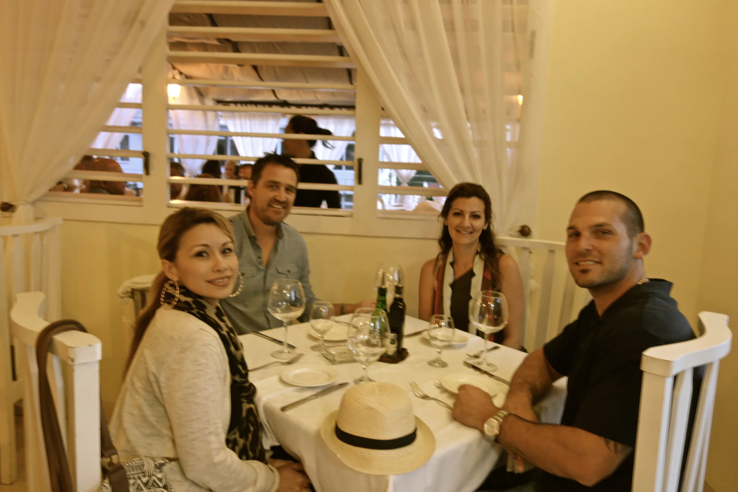  We climb a few flights of stairs in an apartment building to find two units converted into this lovely private restaurant. We're sitting at the kitchen table. 