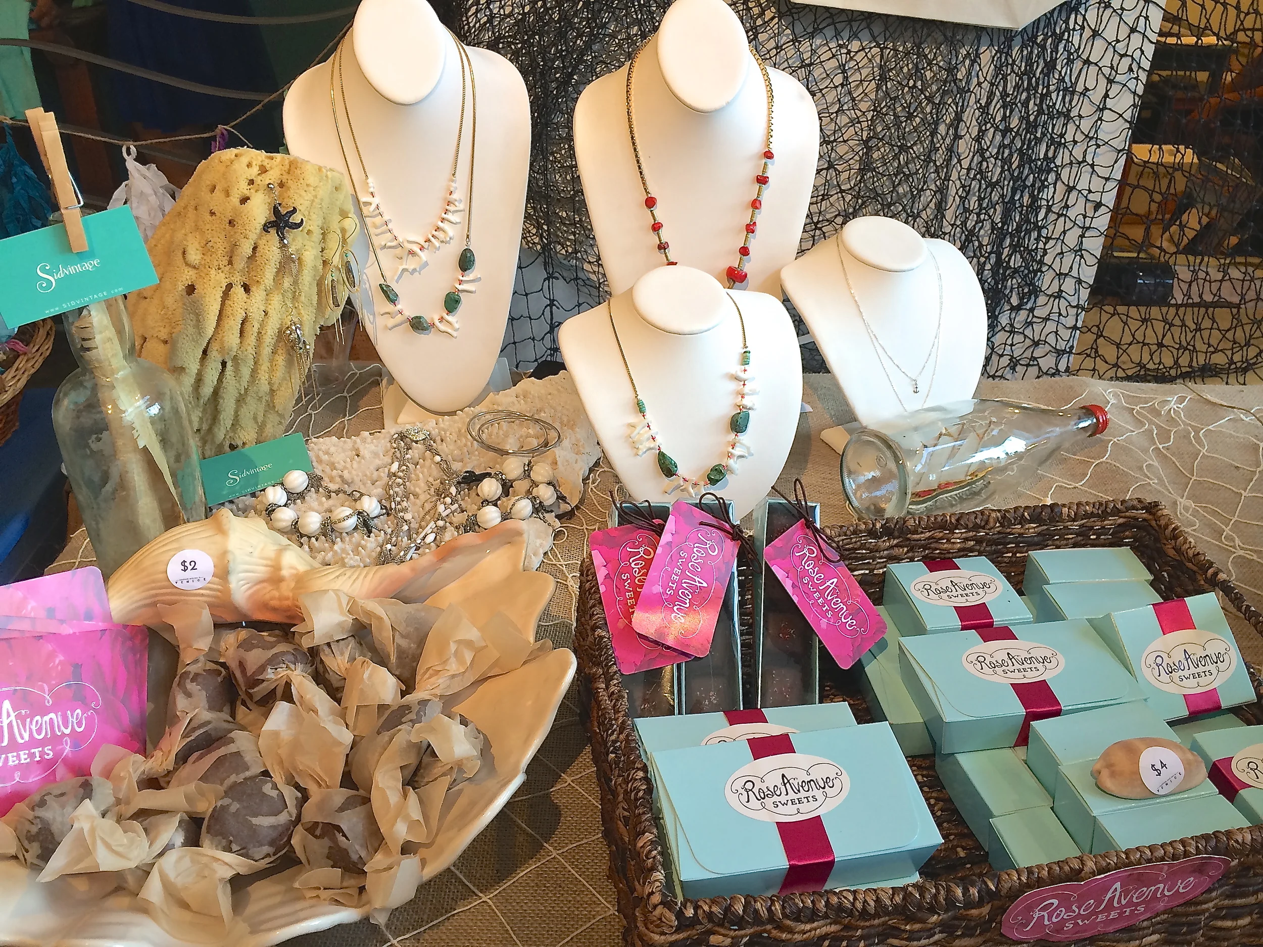  Mermaid treats. Coral and turquoise necklaces from Sid Vintage and sea salt caramels from Rose Avenue Sweets. 