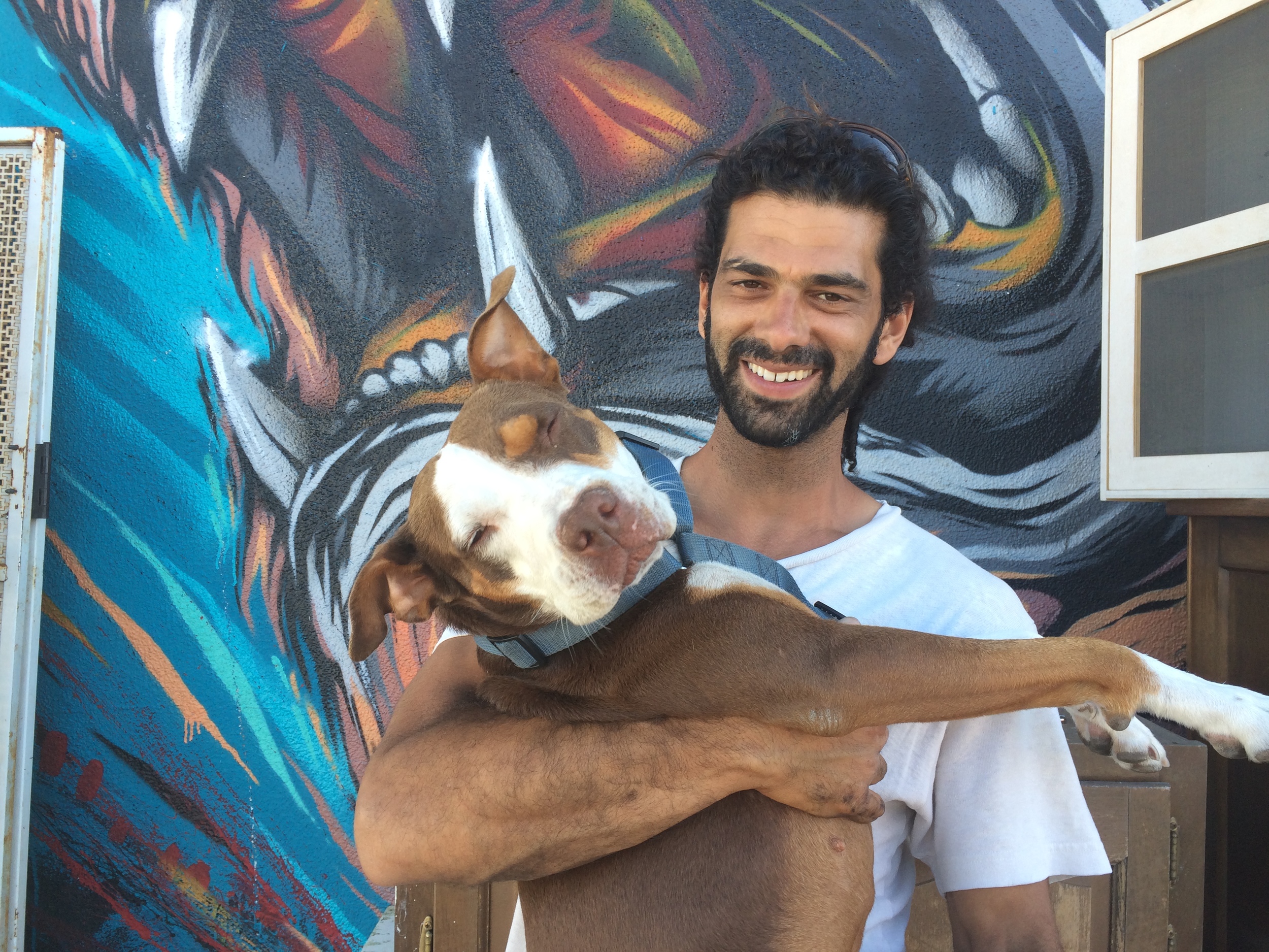 Love Shack owner Udi Levy (pictured in front of the Lion mural because he's a Leo) with bff Ella. In 2010, he turned A Bed For You mattress store into a beanbag shop and creative space.