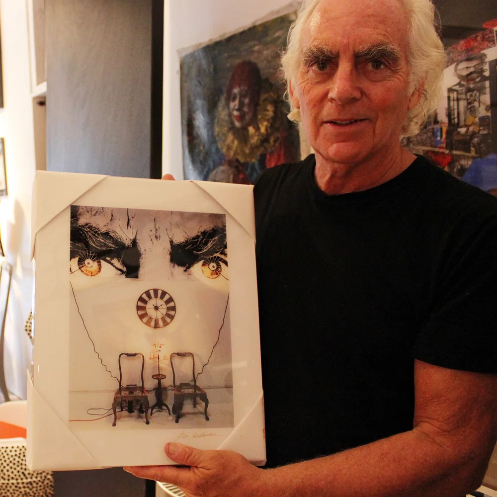  A photograph of Jim Budman's installation framed by his bushy brows. 
