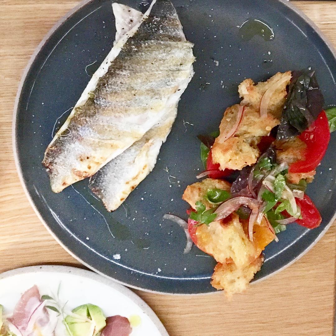Loup de mer with heirloom tomato panzanella ( Photo by Nicole Urso Reed )