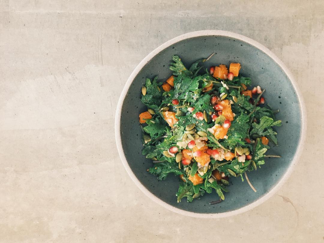 Farytale pumpkin and pomegranate add fall flavor to this red Russian kale salad.