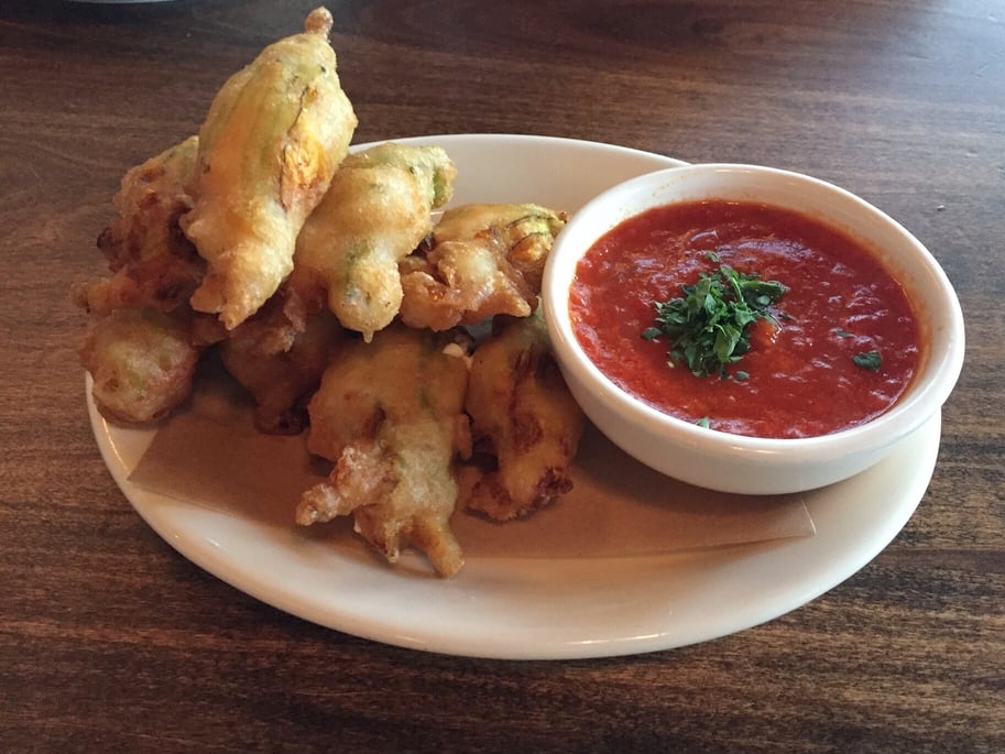 Scopa Italian Roots crispy squash blossoms stuffed with ricotta and mozarella. ( Photo by Vanessa B. via Yelp )