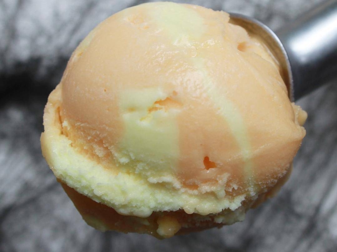 Salt & Straw's jack o’ lantern pumpkin sherbet is made with fresh-scooped pumpkin juice and spiked with swirls of tart lemon sherbet for a brighter spin on autumn pumpkin treats. ( Photo by Salt & Straw Venice )