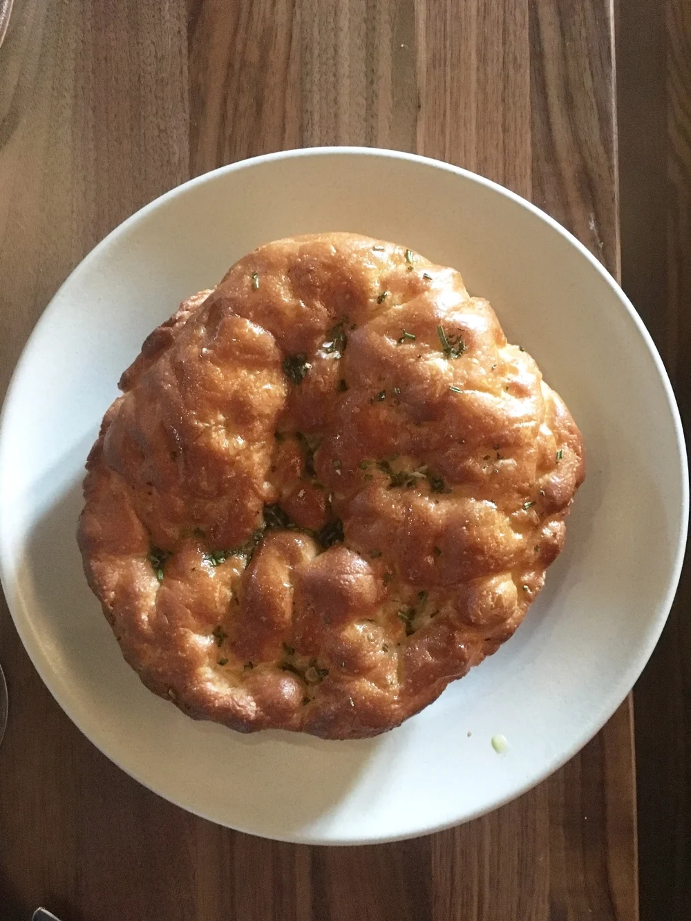 Fresh-baked sfincione with sea salt and rosemary. ( Photo by Erin Behan)