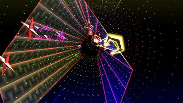 Jeff Minter is doing this on the Vita. Maybe that's where my gaming future lies...