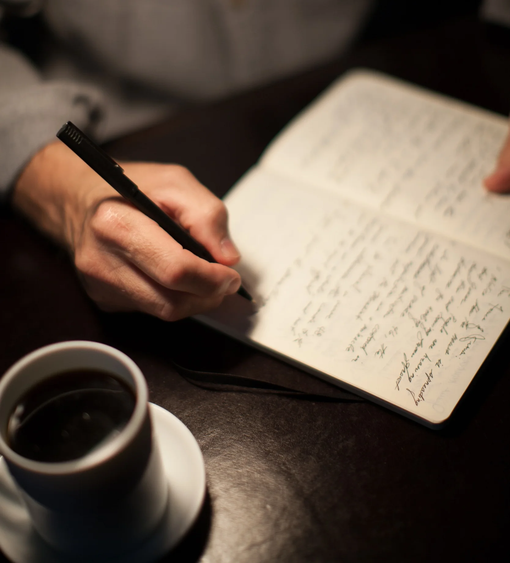 Man Writing in Journal.jpg