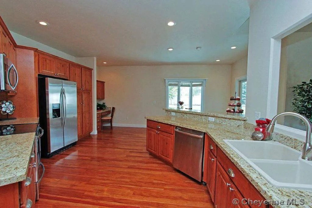 Stunning home in The Pointe! Spacious & flowing ranch-style home with split bedroom concept. Huge kitchen with new stainless appliances, alder cabinets, granite surfaces & eat-in kitchen. Enjoy the sunrises & sunsets on the covered porch & patio. Unfinished basement for storage. Check out this grand home with over 4400 total sq ft!