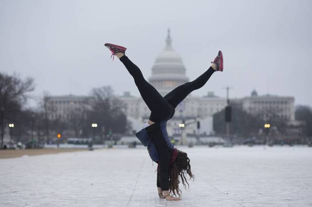 Yetta Stein from Portland does a handstand before the Women's March. (Credit: Peter Cooper/Salon)