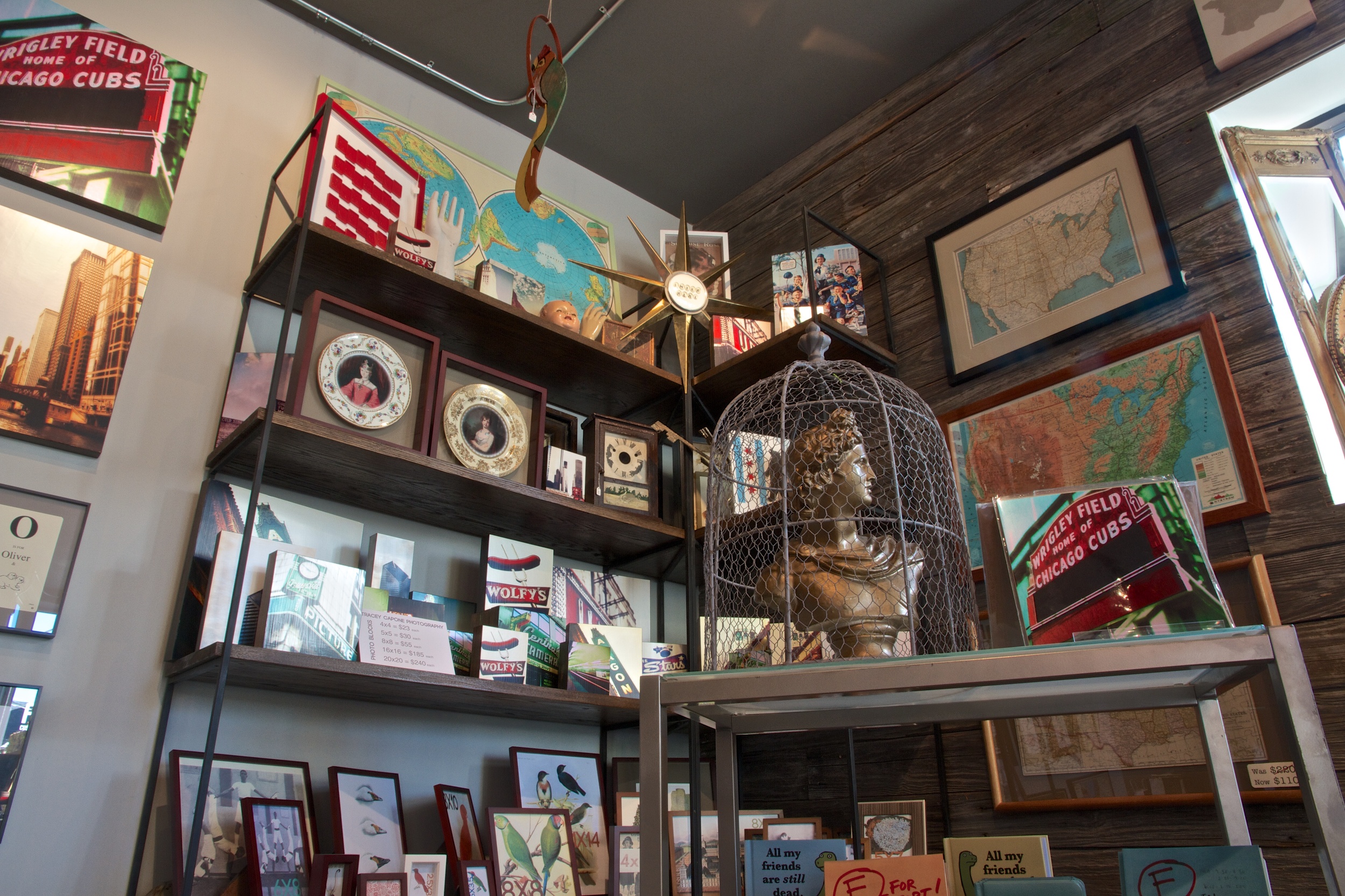 Custom wood and steel shelving was created to maximize retail display space.