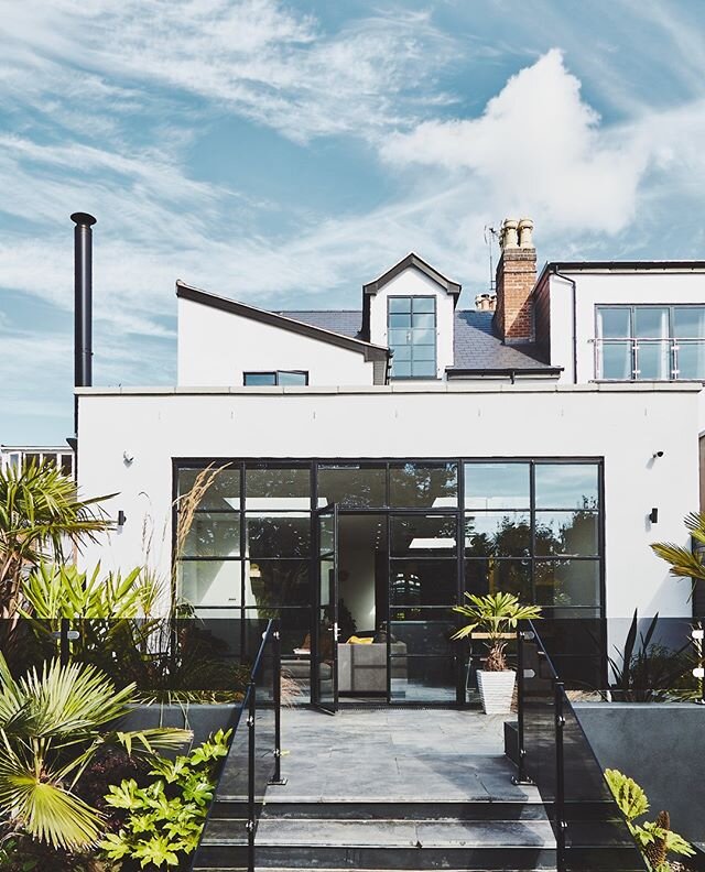 Rear view of the awesome @Victoria_road_restoration - wispy clouds and tropical planting. ⁠
⁠
⁠
#renovation #interiordesign #construction #design #home #architecture #interior #homedecor #homerenovation #remodel #realestate #homedesign #renovationpro