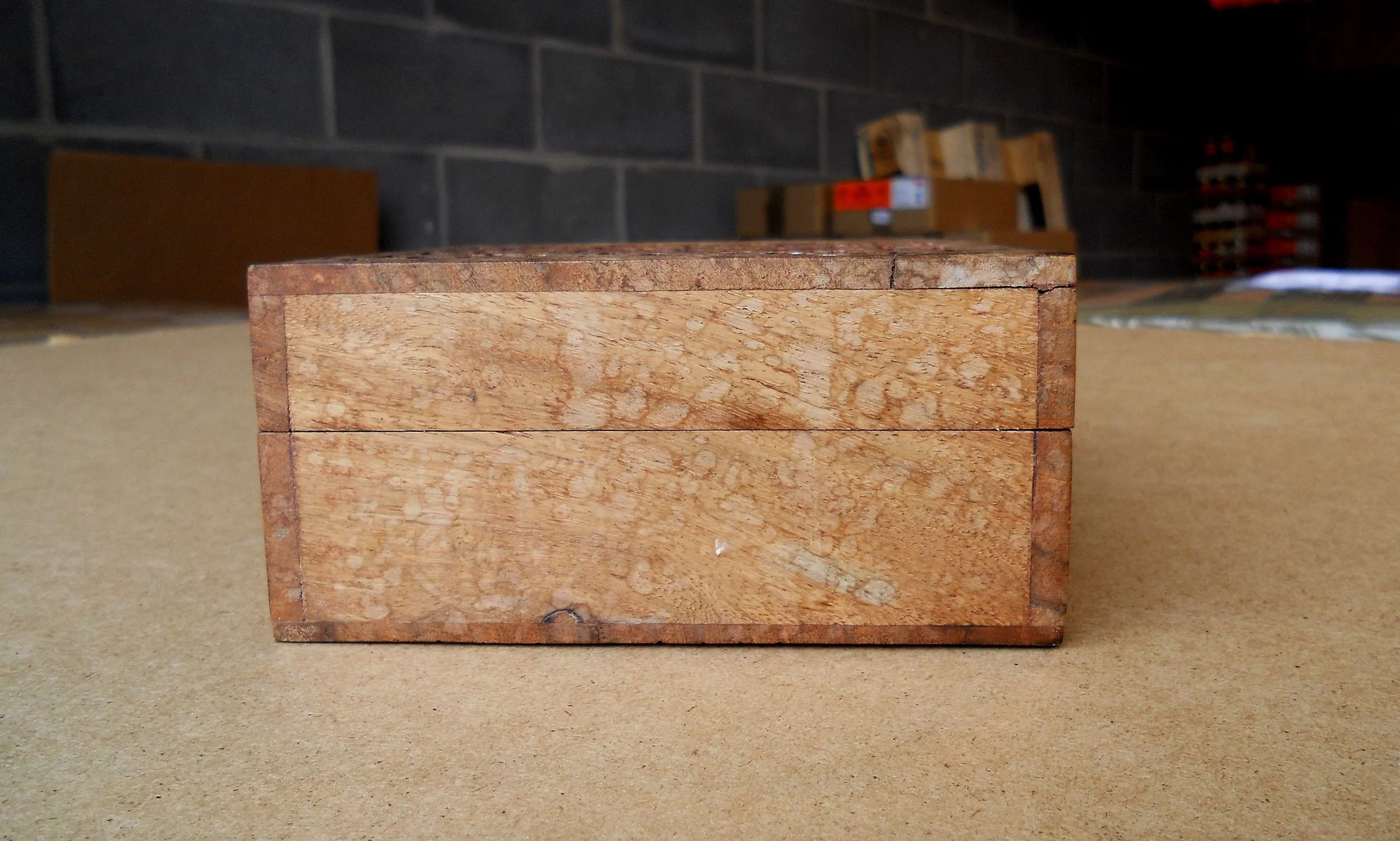 Water damage stains before I started restoring the box with brown beeswax polish