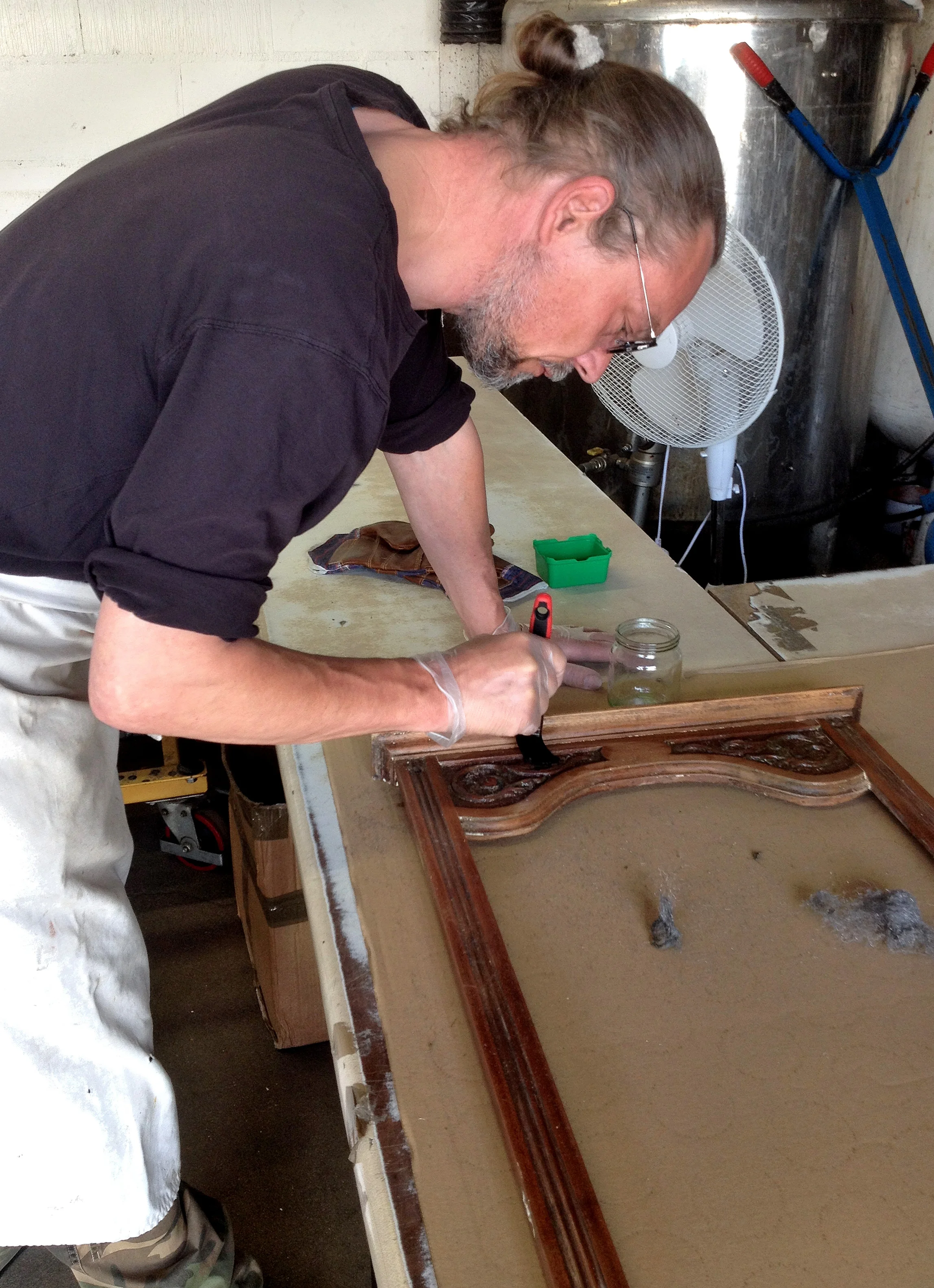 Attempting to remove the paint with paint stripper and wire wool.