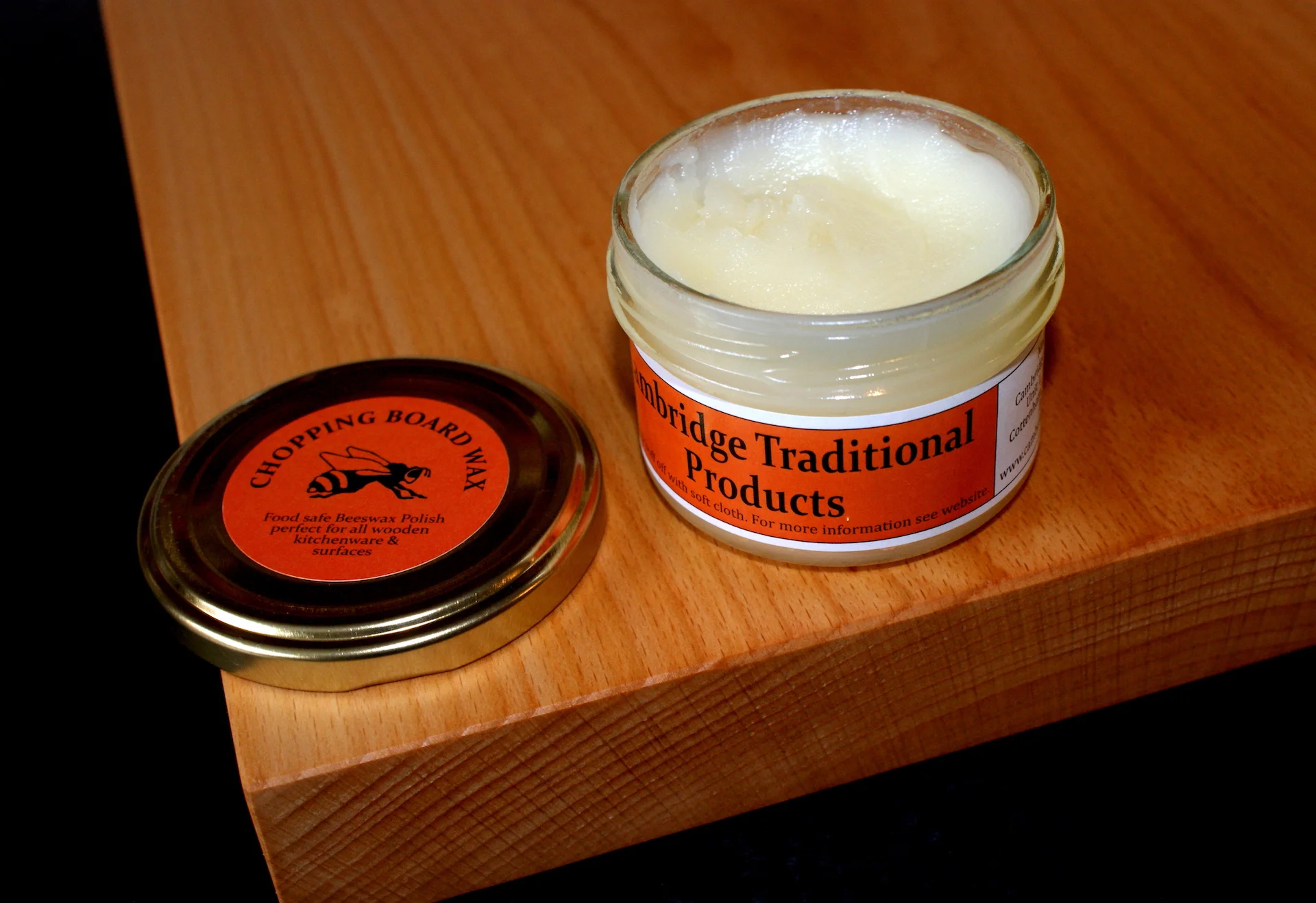 Open small jar of food safe chopping board wax - Cambridge Traditional Products