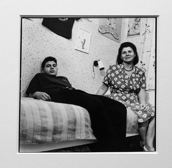 Mother in his son bedroom