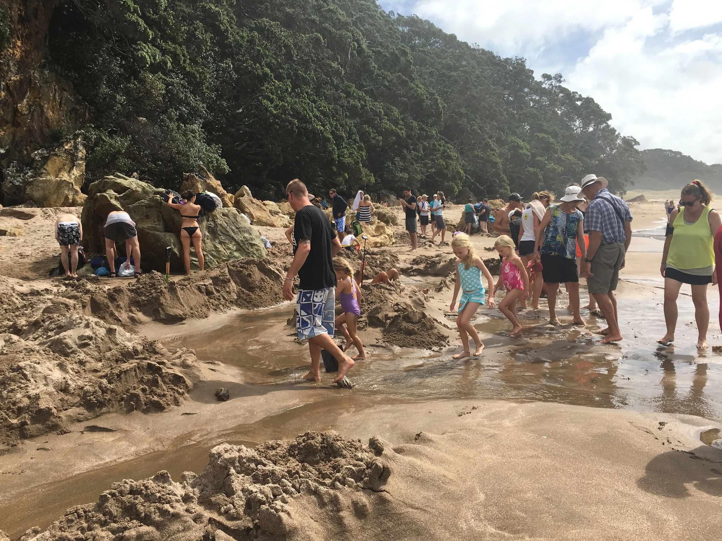 Motivated folks, starting to rebuild their hot tubs after a rogue wave ruined all former efforts