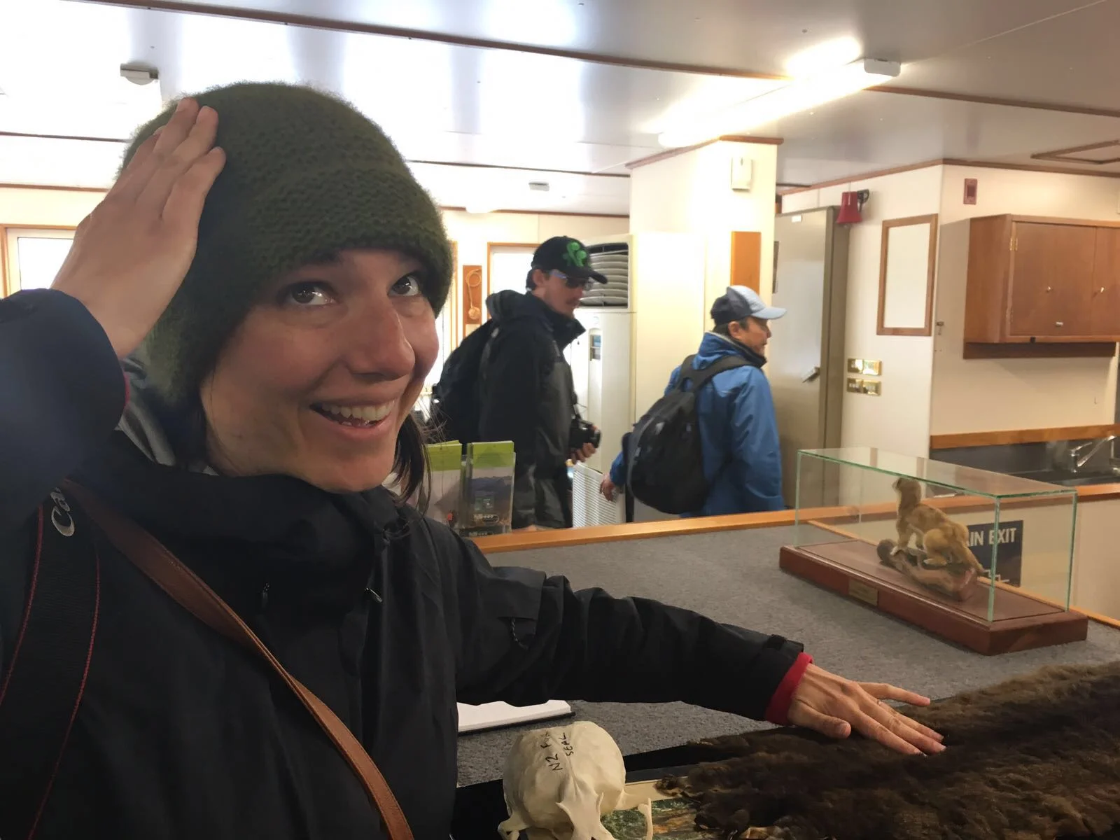 Coincidentally there was a possum skin on our Milford Sound Nature cruise. I had just gotten the possum hat, so I was clearly amused. Adam was super excited about this photo request.