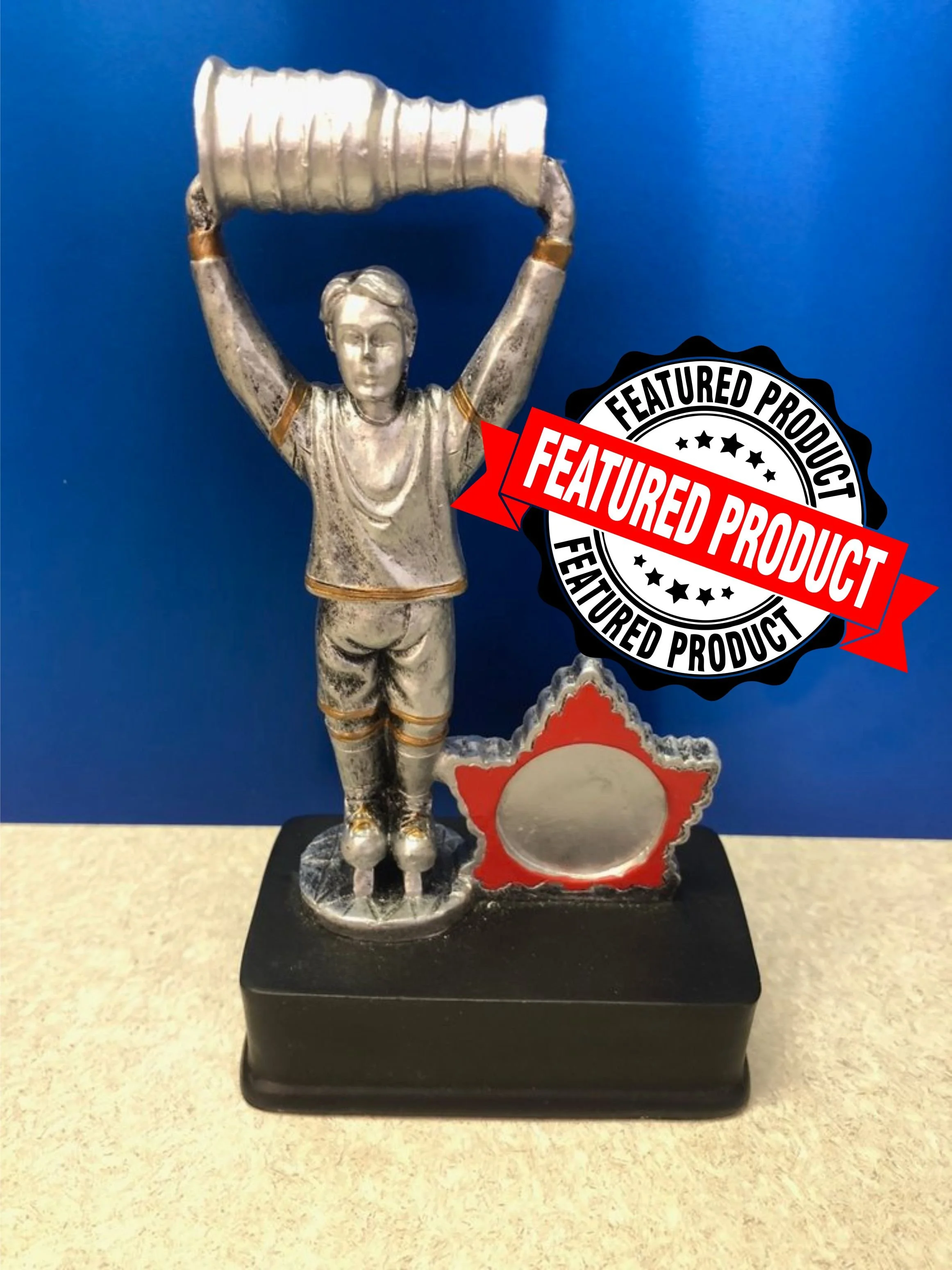 Heart and Hustle Child Holding Cup Award (Includes Engraving)