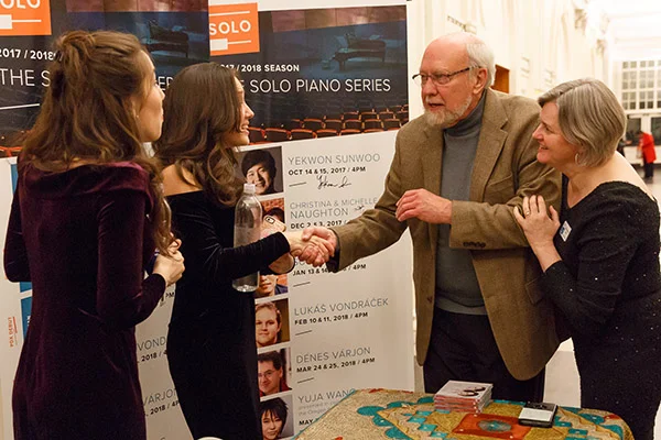Christina and Michelle are introduced to SOLO founder Harold Gray. Photo credit: John Rudoff
