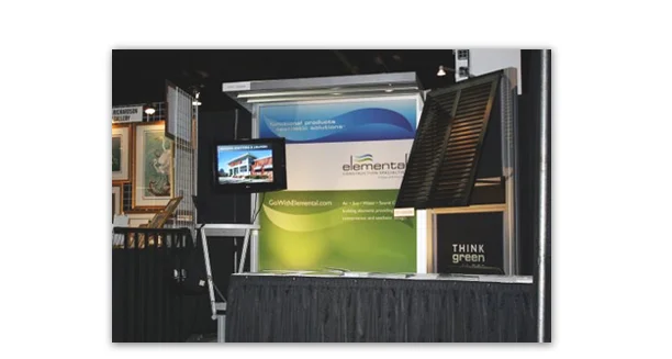 Elemental Construction Specialties booth. This booth was created from actual products that this company sells. Notice the sunshade at the top and the window louvers on the right side.