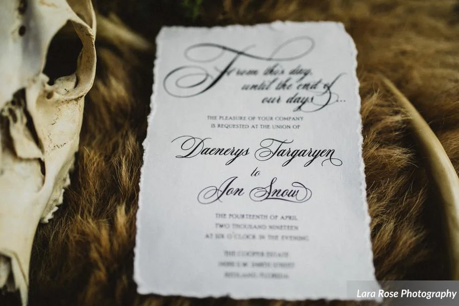 Rustic, hand torn edges wrapped with gray twine sealed with a wax seal. Game of Thrones Wedding invitation by Only One Mark