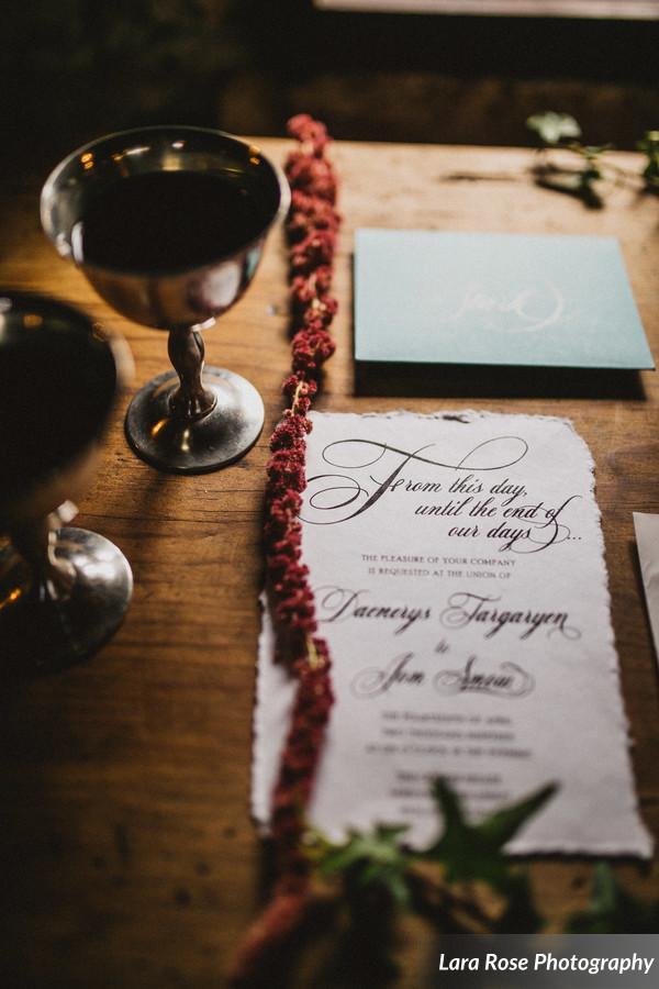 Rustic, hand torn edges wrapped with gray twine sealed with a wax seal. Game of Thrones Wedding invitation by Only One Mark