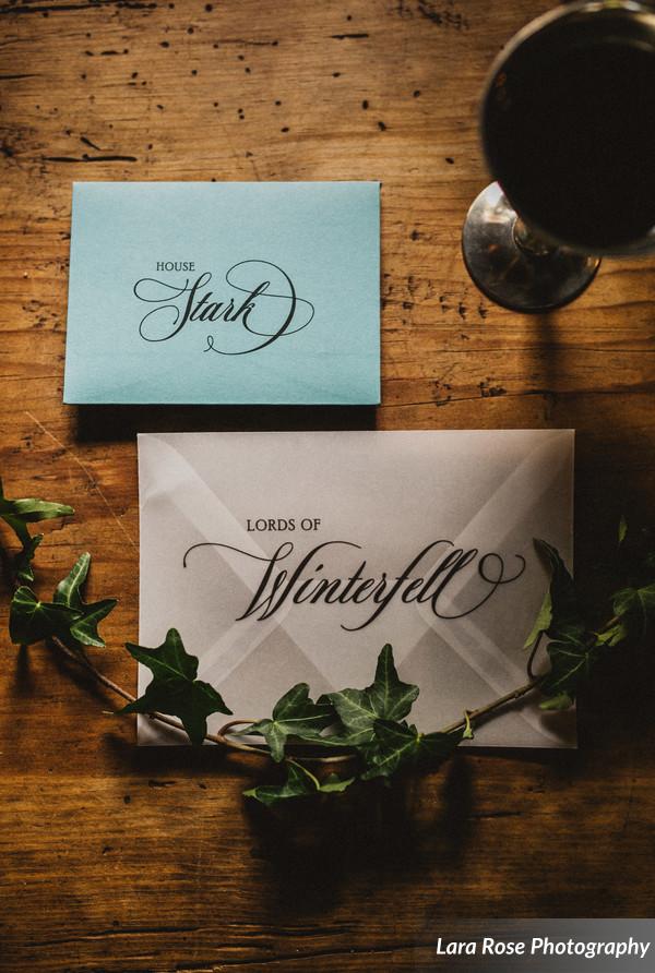 Rustic, hand torn edges wrapped with gray twine sealed with a wax seal. Game of Thrones Wedding invitation by Only One Mark