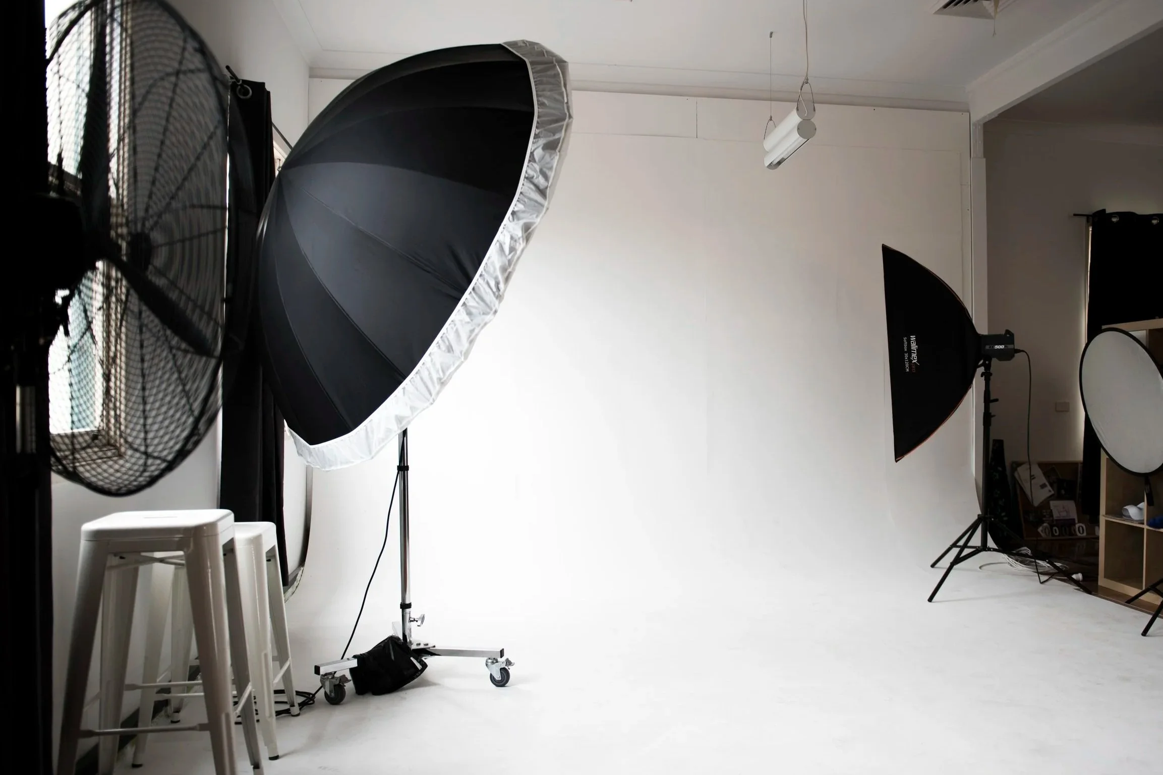 White backdrop and professional studio lighting set up for corporate headshots at my Gordon studio on Sydney's North Shore