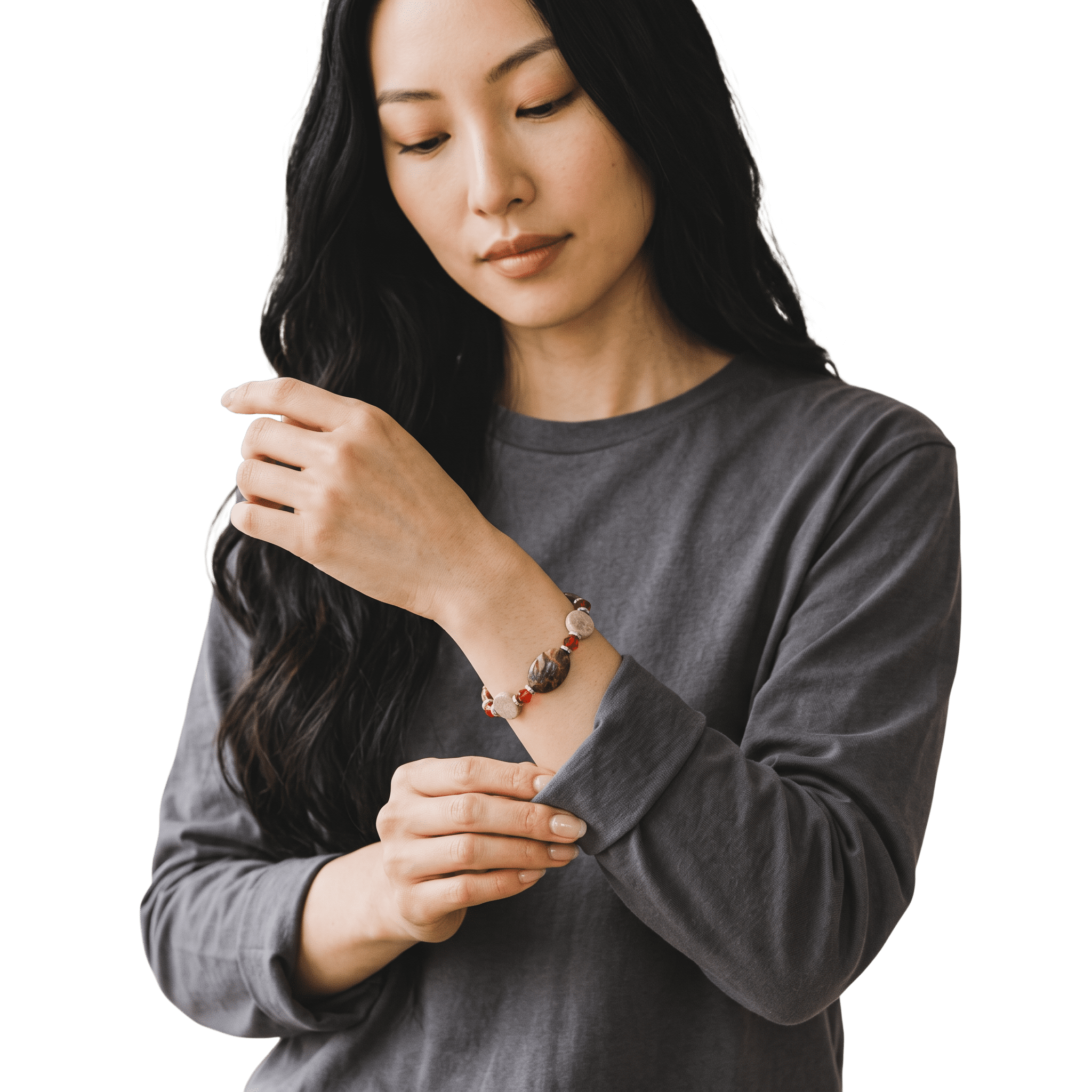 Woman wearing Peacock Jasper, Fossilized Coral and  Swarovski Crystals Silver Plated Bracelet by Lottie's Trinkets