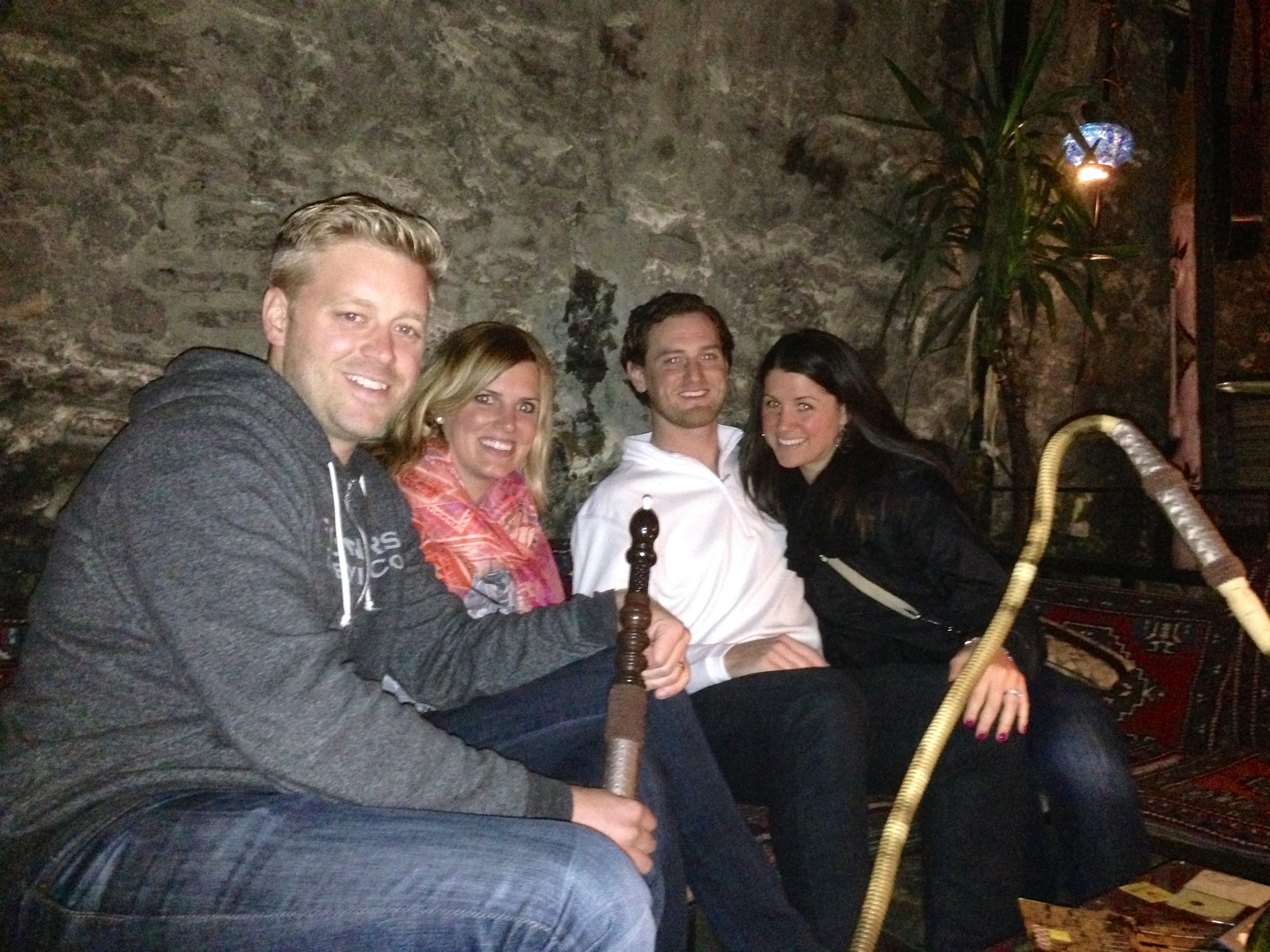 Josh, Emily, Jeff, and Nichole smoking hookah in Istanbul, Turkey