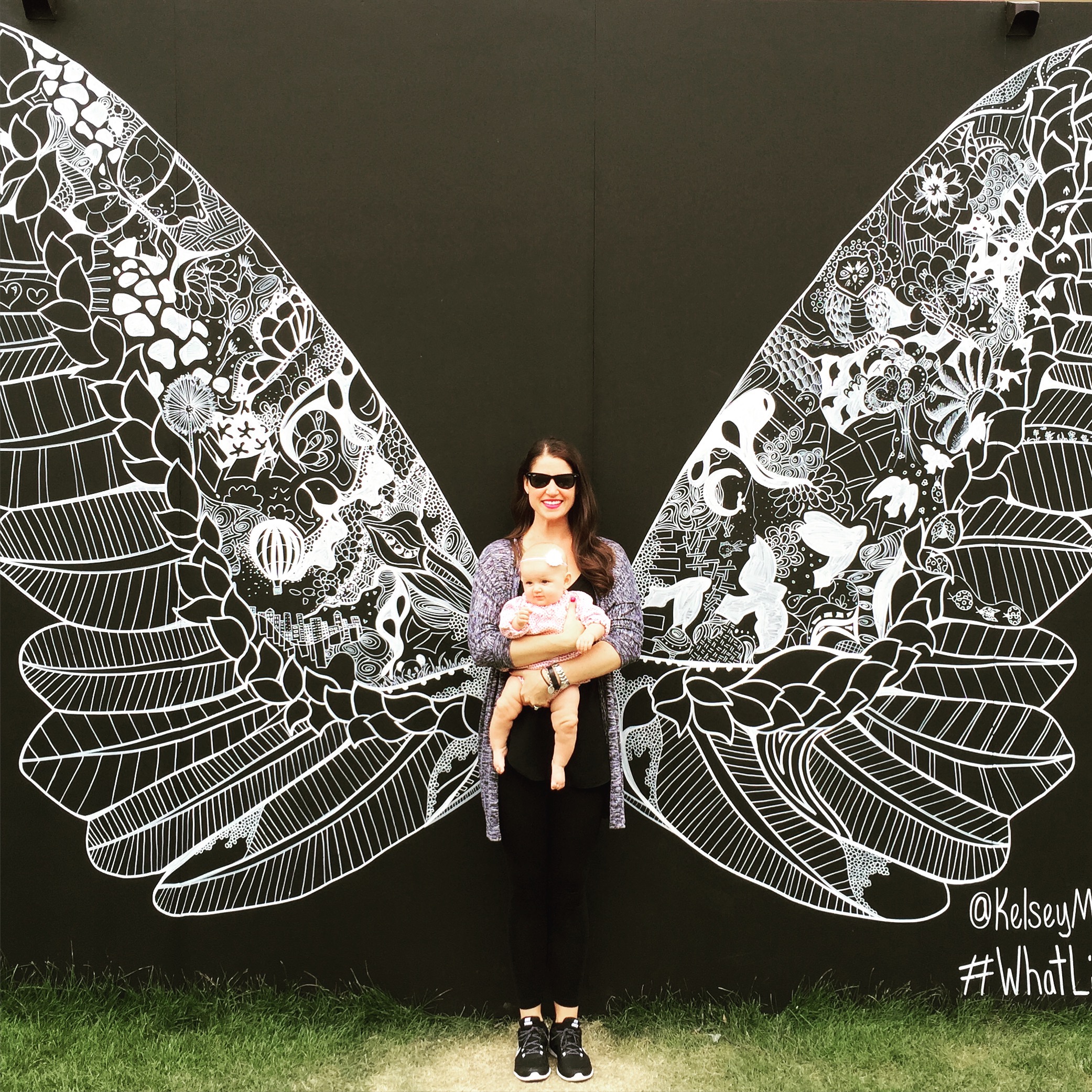 Me and Natalie exploring ArtPrize this past weekend. Pay special attention to Nat's leg rolls :) This photo cuts it off, but the art work is #WhatLiftsYou by @KelseyMontagueArt. 