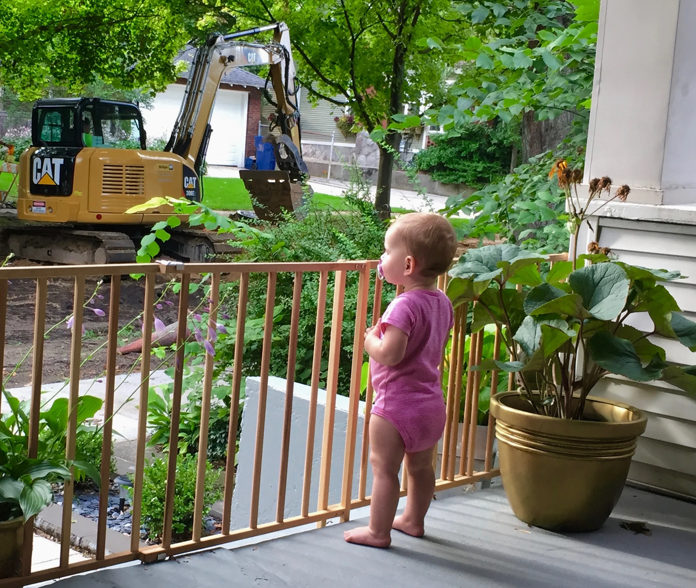 Natalie is loving the commotion on our street much more than Jeff and I are. 