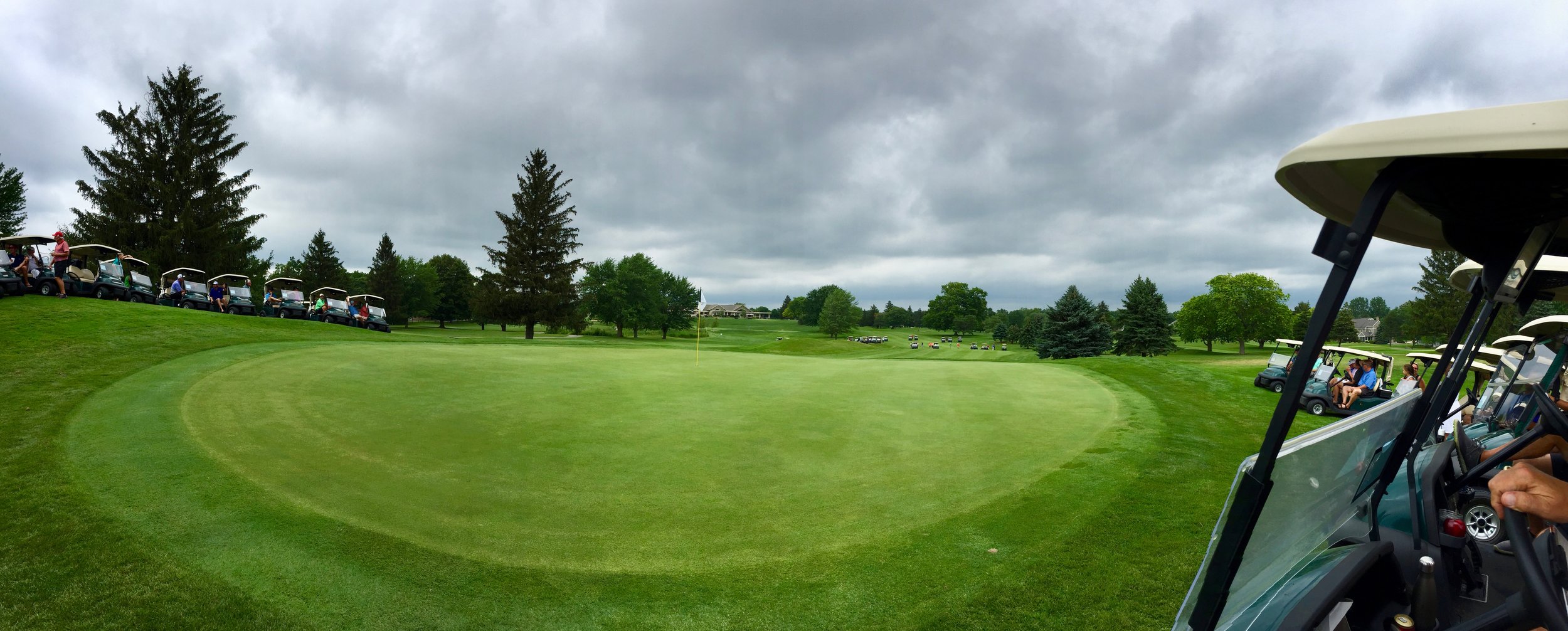 Watching the playoff on the 9th green at Watermark. 